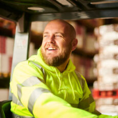 fork lift truck driver in warehouse